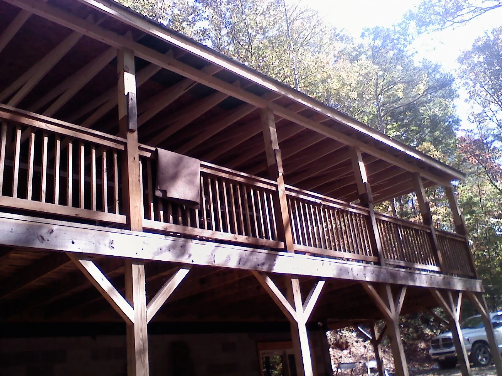 Timber framing under a new elevated porch and deck — Roof Leak Repair in Sun Prairie by Roofing Brothers